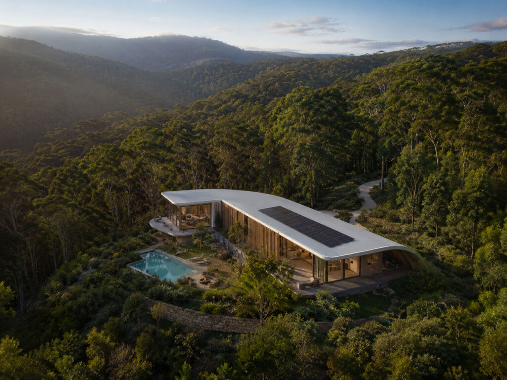 Sustainability House in the forrest surrounded by trees